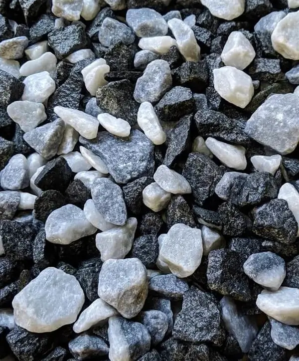 Black and Grey White Hard wearing chippings called Black Ice. Also known as Panda Gravel